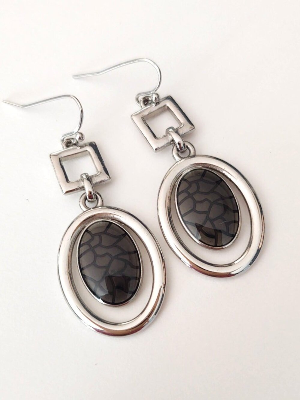 Silver earrings with gray crackle accent centers